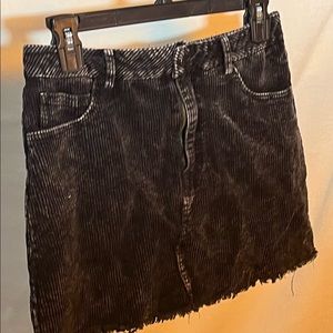 Black distressed corduroy mini skirt